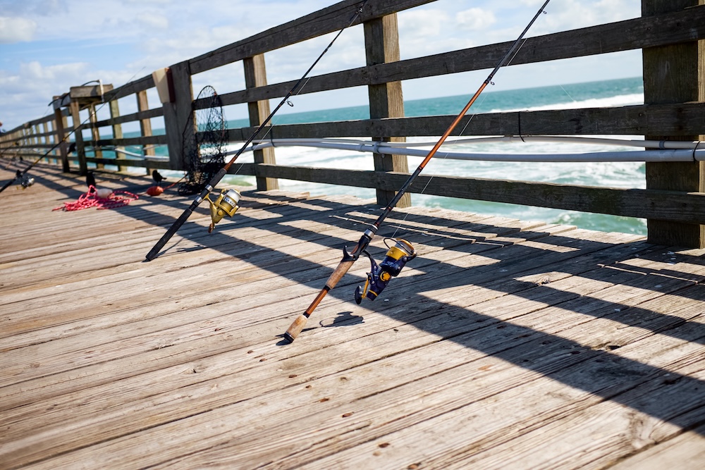 Fishing poles on a pier