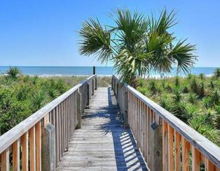 A walkway through the dunes to the beach