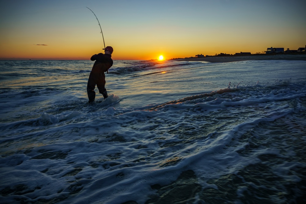 Man surf fishing