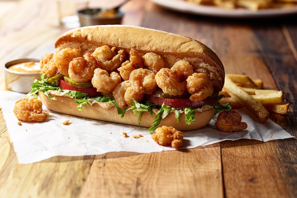 Shrimp po' boy sandwich on a table